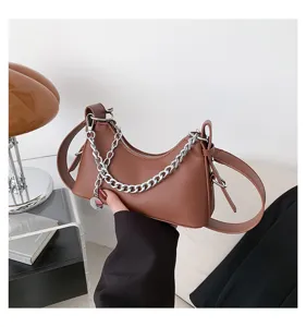 Brown PU leather underarm shoulder bag with chic silver chain strap detail for women daily style.