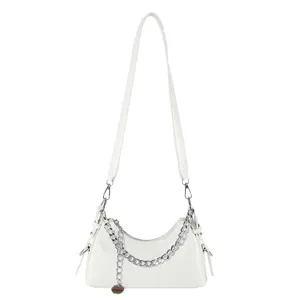 White leather shoulder bag detail showing chic silver metal chain strap and elegant design.