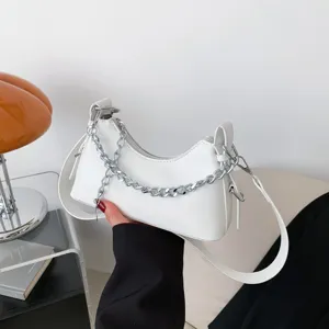 Stylish white baguette shoulder bag for women with chic silver chain strap and minimalist design.