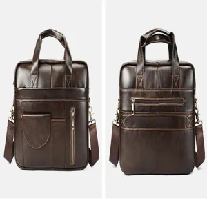 Vista dettagliata della ventiquattrore in pelle marrone con tasche con zip e manico robusto.
