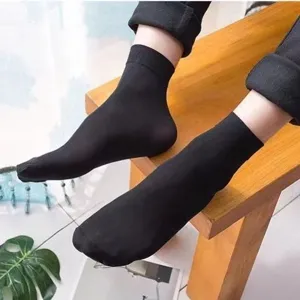 Men's black thin mid-calf dress socks, breathable silk summer casual hosiery for daily wear.