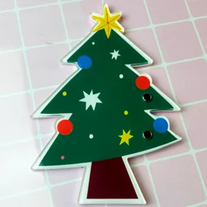 Acrylic Christmas tree eyelash extension tray detail view with colorful decorative patterns.