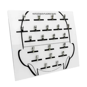 Tavola di posizionamento per extension in acrilico con clip metalliche per parrucche.