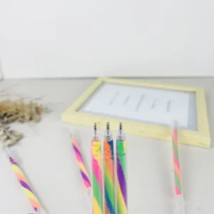 Rainbow gradient gel pen set with multi-color ink, creative writing stationery for students.