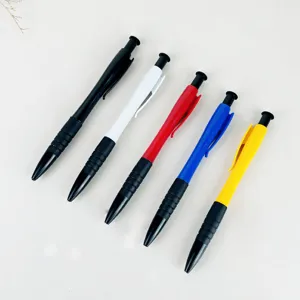Assorted color retractable plastic ballpoint pens with black rubber grip for office school.