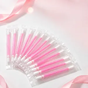 Disposable individual packaged cotton swabs with pink sticks for daily cleaning and care.