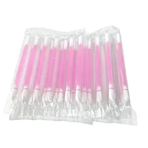 Disposable sterile cotton swabs with individual packaging, pink liquid cotton sticks for care.