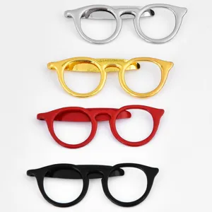 Novelty glasses shape metal tie clips set in silver, gold, red, and black colors.