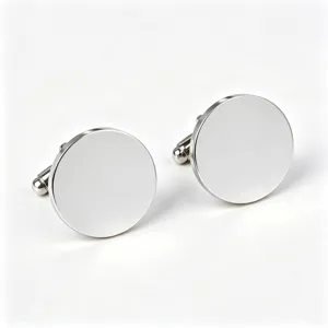 Stainless steel round polished cufflinks detail, minimalist men's shirt accessory.