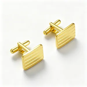 Gold square striped cufflinks for men, classic French cuff link accessories detail.