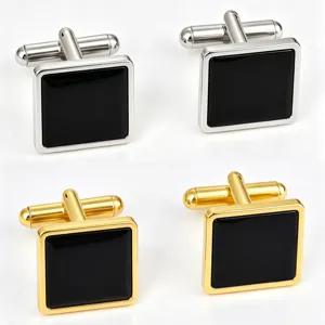 Men's square cufflinks in gold and silver tone with elegant black enamel inlay for formal shirts.