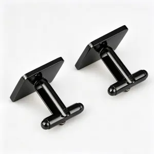 Black square stainless steel French cufflinks detail view, highly polished design.