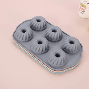 6-cavity silicone bundt cake mold for baking delicious pastries, jellies, and puddings easily.