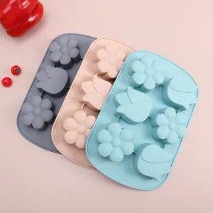 Silicone cake mold baking pan with cute flower and tulip shapes for making chocolates.
