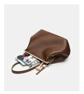 Large brown kiss lock clutch bag stylish metal frame evening handbag spacious design