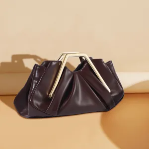 French retro dark brown leather cloud bag with gold geometric metal handle for women fashion