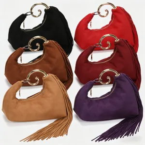 Vintage suede fringe handbag with unique metal swirl handle elegant evening clutch bag.
