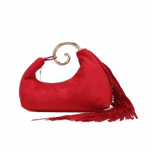 Red suede fringe handbag with unique gold spiral handle, elegant evening clutch bag.