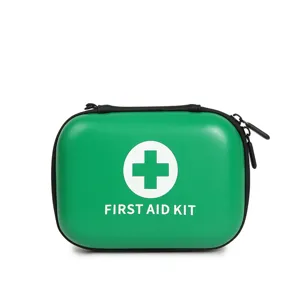 Sac de premiers secours vert portable, organiseur médical compact pour voyages et urgences.