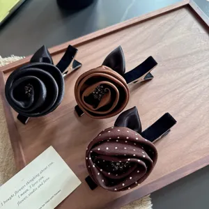 Retro fabric rose hair clip with rhinestones, elegant duckbill clip for women and girls detail