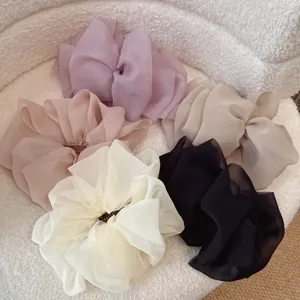 Grand clip banane nœud en tulle, pince à cheveux élégante pour queue de cheval chic.