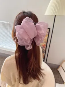 Élégante pince à cheveux nœud papillon en tulle grand format, accessoire coiffure pour femme.