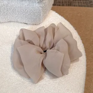 Pince à cheveux grand nœud en tulle élégante pince banane couleur champagne pour femmes