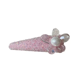 Sweet pink rhinestone flower pearl BB hair clip for women side fringe and bangs styling.