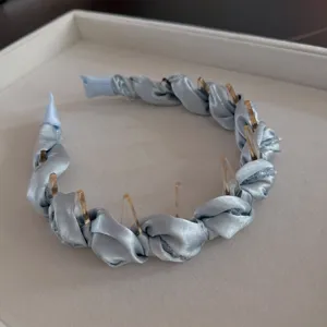 Sweet crystal wrapped headband for women, elegant hair hoop for daily wear and styling.