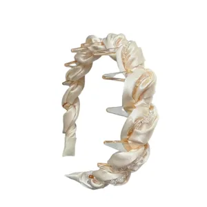 Sweet satin wrapped crystal headband with teeth, elegant hair accessory for women daily wear main view