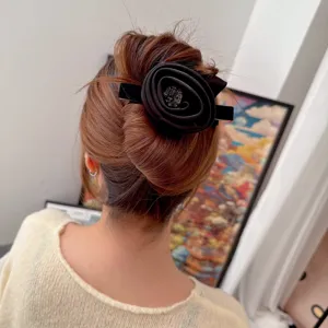 Vintage fabric rose hair clip with rhinestones, elegant black duckbill clip for women's buns.