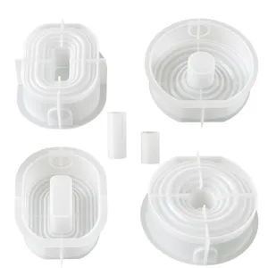 Silicone mold for DIY vase crafting, round and oval shapes, perfect for handmade flower arrangements.