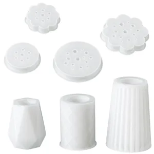 Silicone mold detail showing flower lids and geometric vases for DIY crafts.