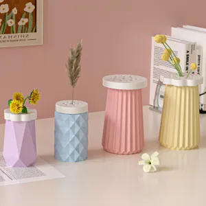 Decorative pastel geometric vases and flower arrangement lids with multiple color options.