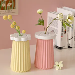 Detailed shot of Nordic style fluted desktop vases with creative flower lids for home decor.