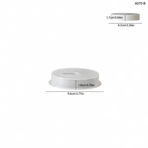 Detailed view of white silicone candle mold showing precise dimensions and circular design.