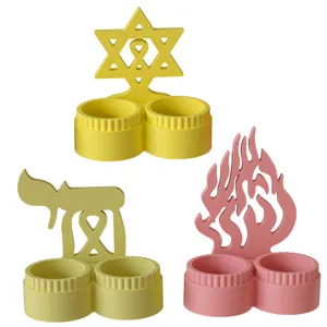 Silicone mold for double cup candle holder featuring star of david and flame shapes for DIY.