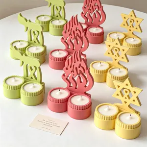 Detailed view of double cup scented candle holders with creative flame, star and animal plaster shapes.