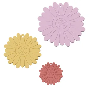 Silicone flower mold set with hanging holes for DIY coaster and aroma plaster craft detail view