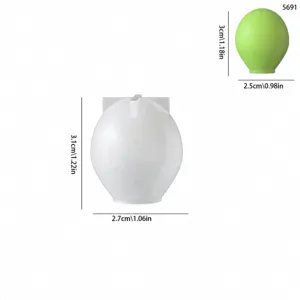 Close-up detail view of 3D balloon silicone candle mold with precise size measurements.
