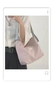 Detailed view of the stylish contrast color canvas underarm shoulder bag for women daily wear.