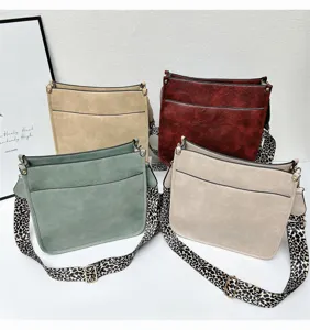 Stylish women's crossbody tote bag with leopard wide strap, large capacity bucket design.