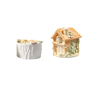 Close-up details of 3D forest owl wooden house and cream candle cup silicone mold craft.