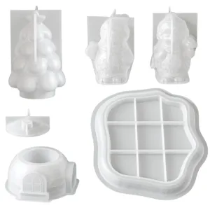 Christmas silicone candle mold set including tree, snowman, igloo and tray for DIY crafts.