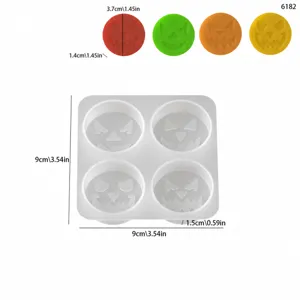 Halloween 4-cavity round silicone mold for candle and soap making with pumpkin ghost face.
