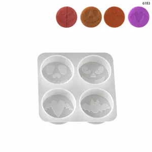Halloween 4-cavity round silicone mold for candle making, ghost and bat pattern design.