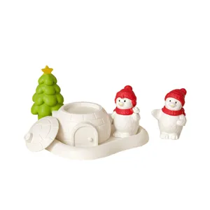 Detailed view of Christmas silicone mold set featuring igloo jar, tree and cute snowmen.