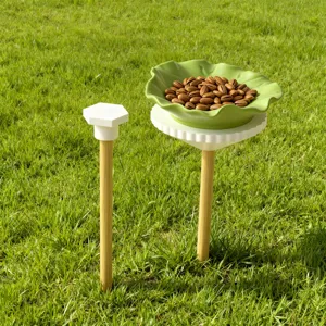 Outdoor garden plant stand decor tray mold, green leaf and white hexagonal display.