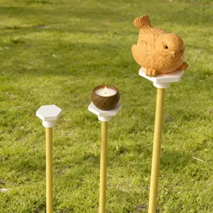 Outdoor garden stake plant shelf detail featuring hexagonal platforms with cute bird and candle.