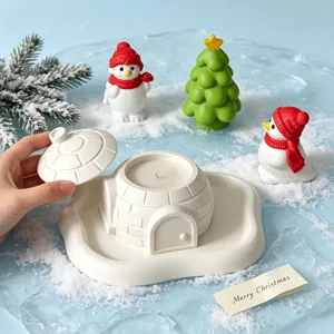 Christmas igloo candle jar detail with cute snowman and tree figurines for holiday decor.